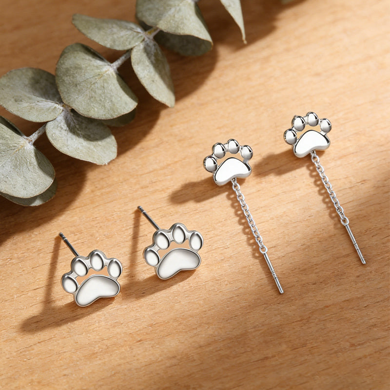 A Set of Four Sweet Little Paw Earrings Featuring Adorable Animal-themed Fun Cat Paw Ear Wires. These Soft and Cute Kitten Paw Print Earrings Are an Ideal Gift for Friends, Besties, or Loved Ones. Simple and Stylish, They Are Suitable for Casual